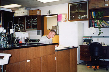 Michael sitting at a desk, working