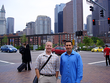 Two people in front of a street in Boston smiling
