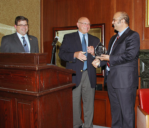 Dr. Karandikar receiving an award