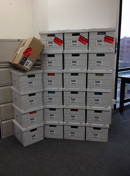 A stack of boxes from Dr. Karandikar's Southwestern office